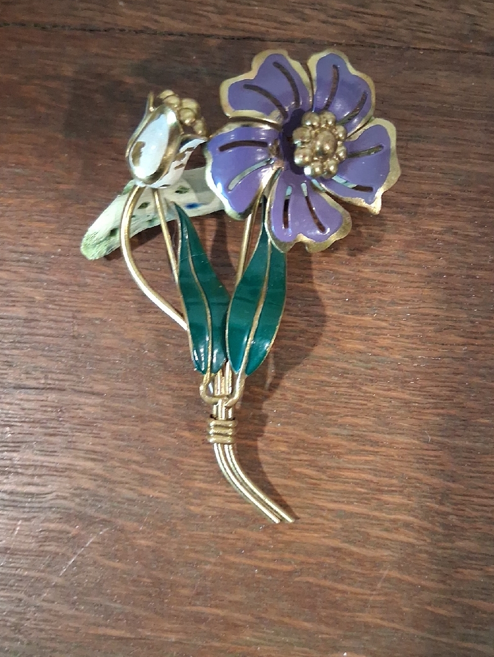 Gold-Tone Purple Enamel Floral Brooch with Green Leaves